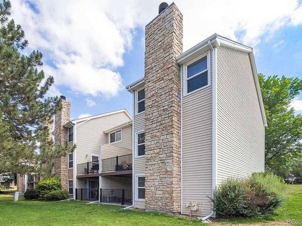Beautiful Chimney and Large Grassy Area Behind and Adjacent to the Home