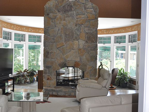Two sided stone fireplace