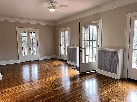 Front room with doors to the expansive front porch
