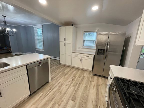 Freshly Renovated Kitchen with Stainless Steel Appliances