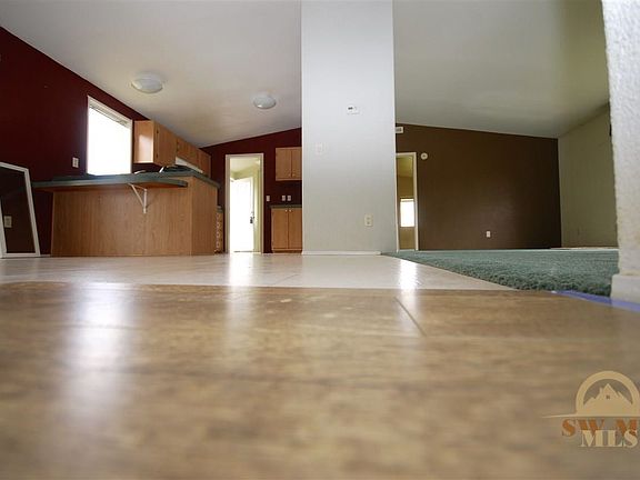 New flooring to be installed in the dining room. Look at how the sample looks in the house!