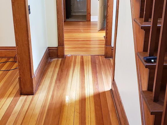 Entrance leading to kitchen and main floor bedroom