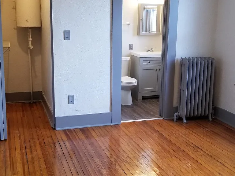 SPACIOUS BEDROOM WITH ORIGINAL HARDWOOD FLOORS