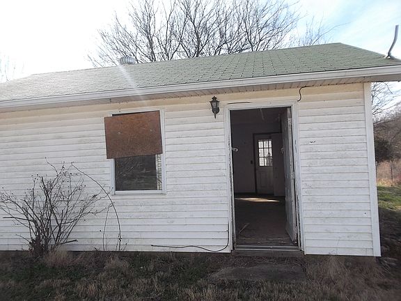 HOUSE ON LEFT N MAIN PIC. 
