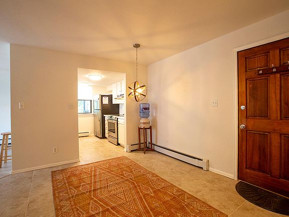 Dining area towards kitchen view.