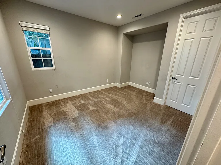 Downstairs bedroom w/ attached bath
