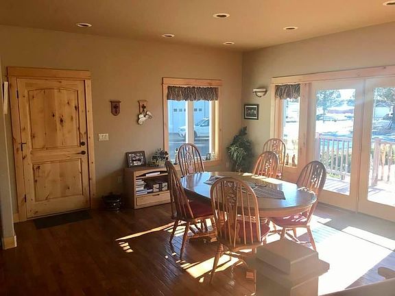 There is a new dining table that seats 8 currently.