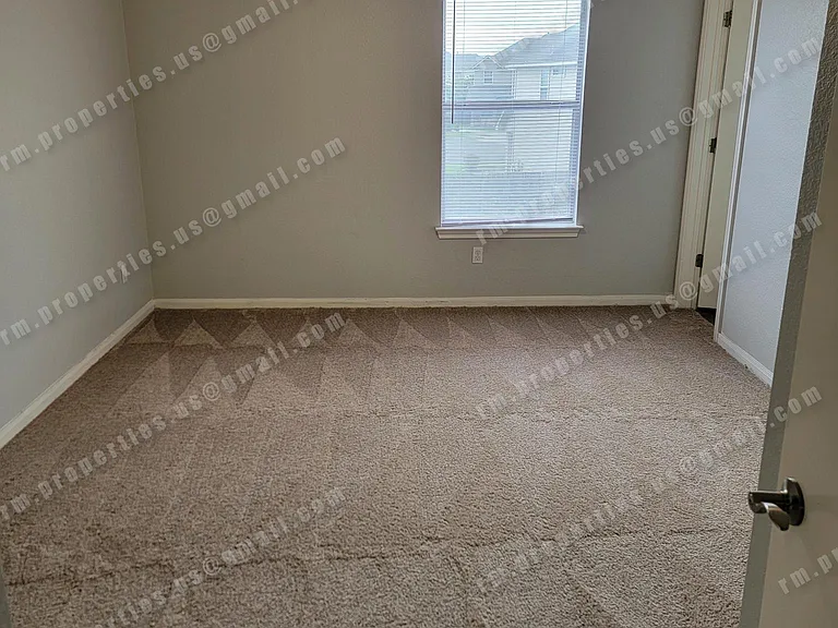 Master bedroom with two large closets and a bathroom