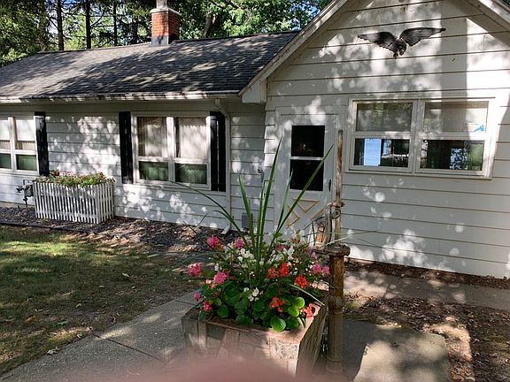 View of the ranch style house from the road.
