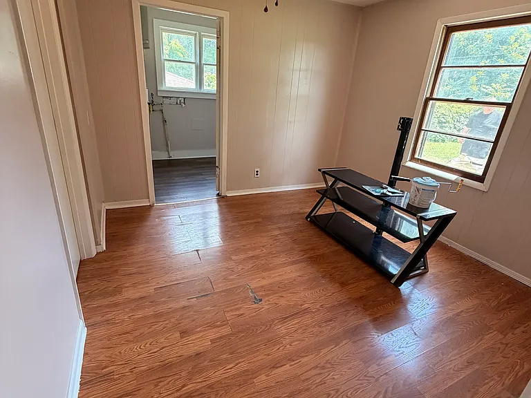 2nd bedroom that connects with laundry room bathroom and 4th bedroom