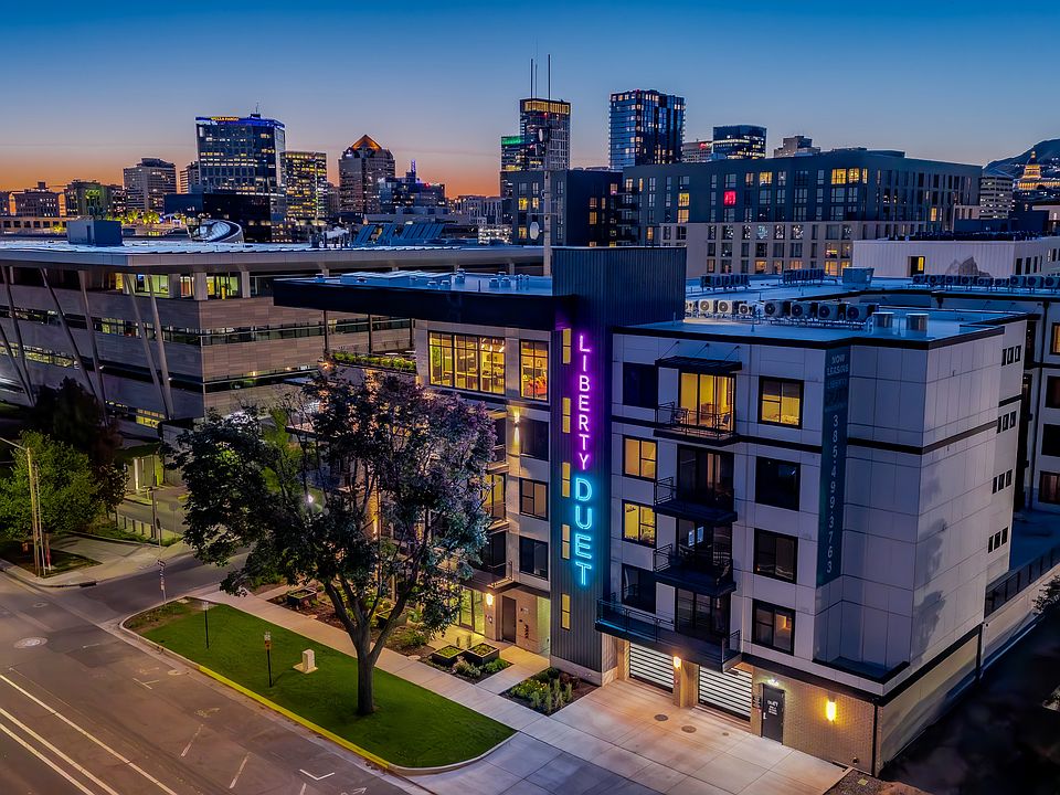 Liberty Duet Apartments, Salt Lake City, Utah; exterior well-lit front at night.