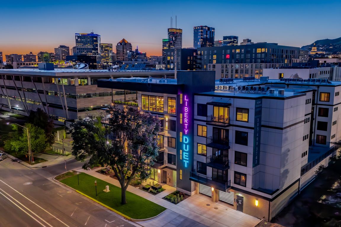 Liberty Duet Apartments, Salt Lake City, Utah; exterior well-lit front at night.