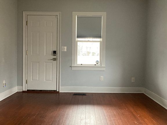 View of front door and living room.