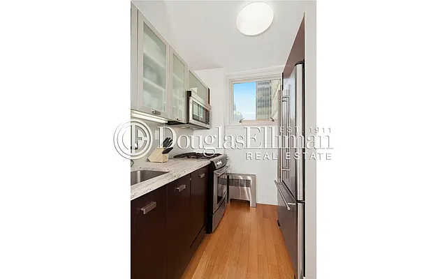 Sold by Douglas Elliman | media 12