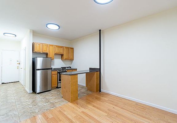 5th image of 315 E 5th St APT 2H