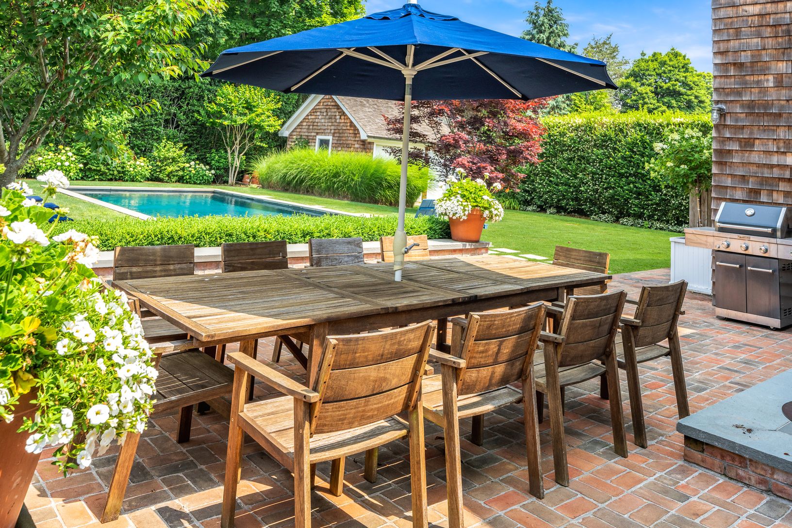 Back patio with dining and grill area