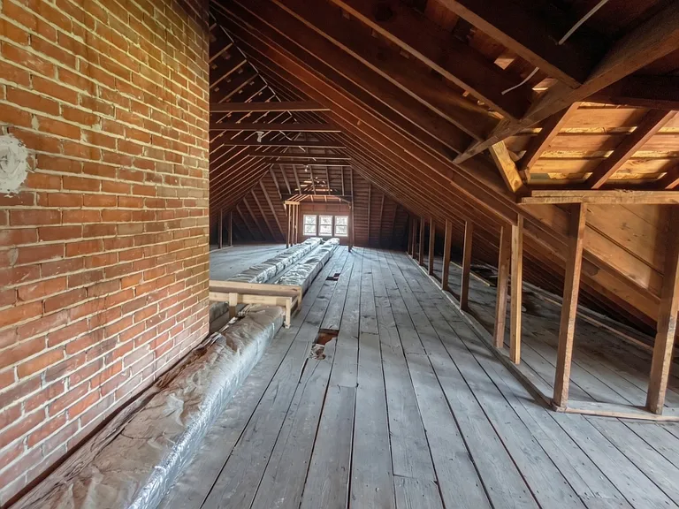 Attic space designated for additonal tenant storage, if needed.