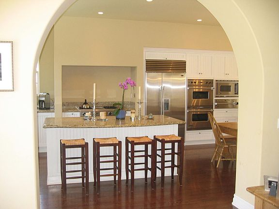 VIKING and sub zero kitchen appliances, gleaming hardwood floors
