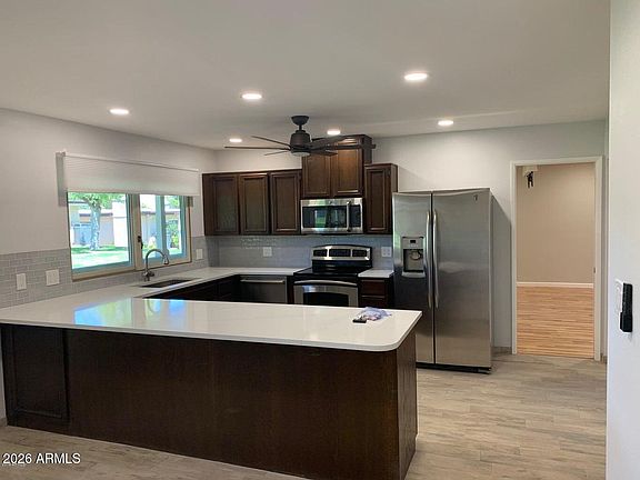 4th image of 6110 E HARVARD Street