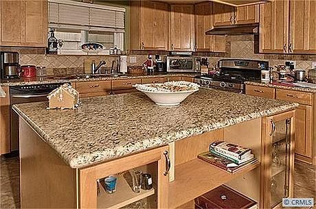 Spacy kitchen with island