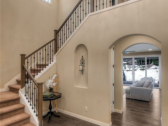 This home will impress the moment you step through the front door and into this airy grand foyer.