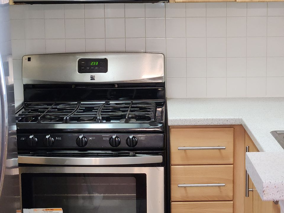 Stainless steel applianeces. Stove, refriderator, dishwasher, built in microwave.