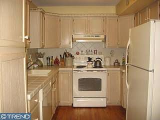Kitchen with tile countertops