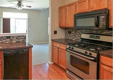 Convenient, updated kitchen. SS fridge, sink and lighting.