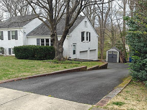 1st Driveway to garages and mudroom entrance.
