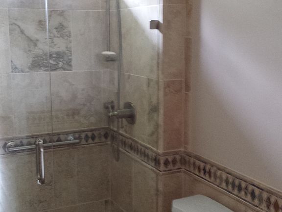 Travertine tile & glass door