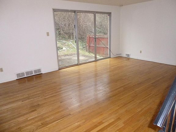 Living room with slider onto patio/yard