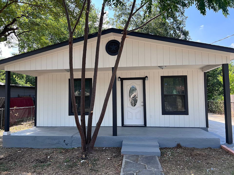 Front of house with patio