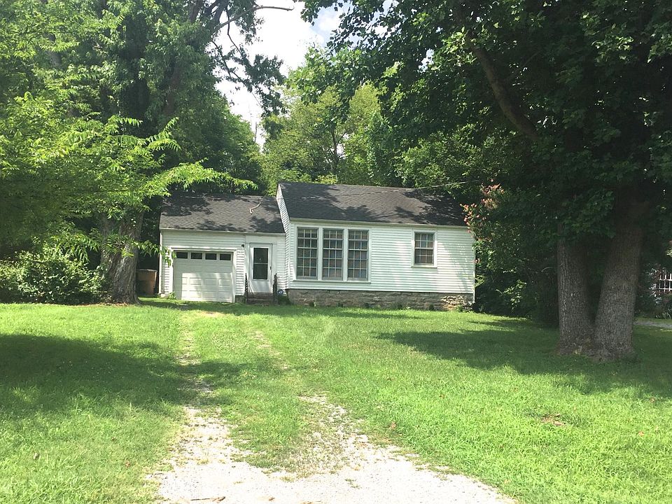 Charming exterior with one car garage, plenty of parking, ma