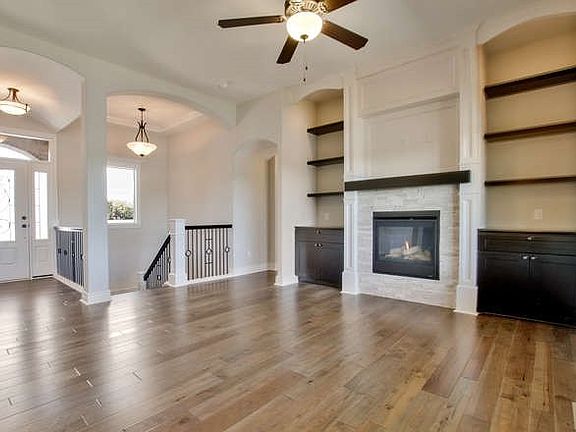 Stone Fireplace With Built-ins