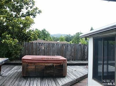 relax in the hot tub with views of mountains