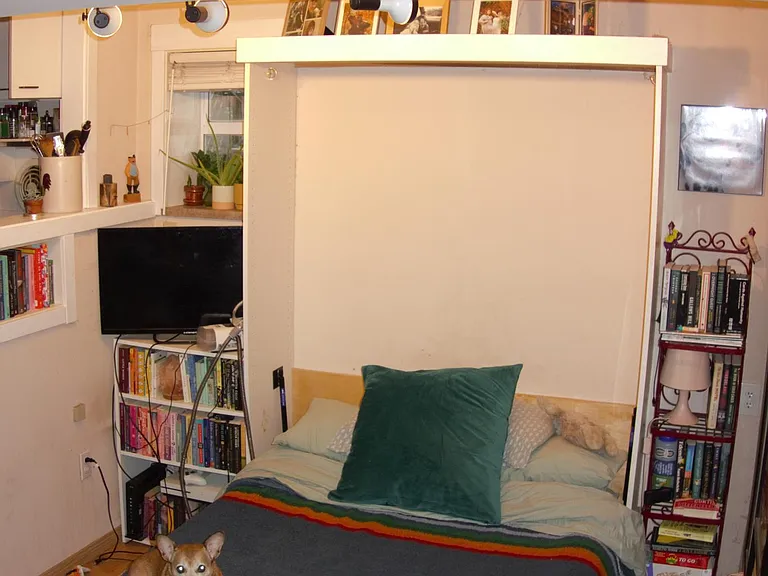 Room for a bed with shelves in living area