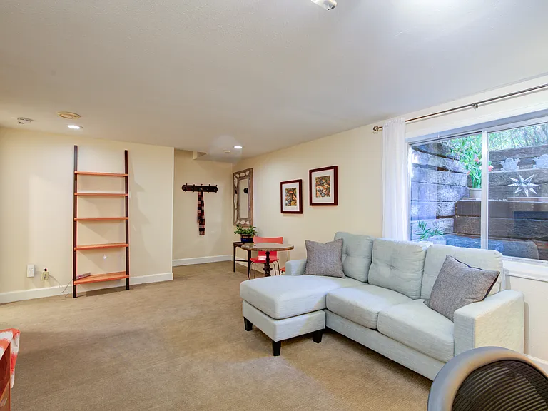 Spacious living room with large comfy couch