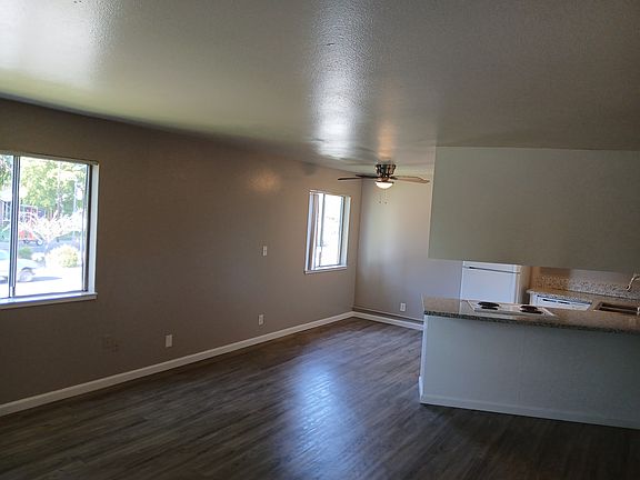 Fresh paint, eat in kitchen with ceiling fan, granite countertops, plenty of storage space in kitchen, hall closets, extra-large room closets.