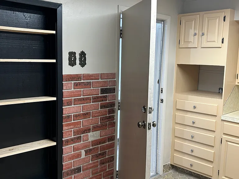 Kitchen access from back or down steps inside property.
