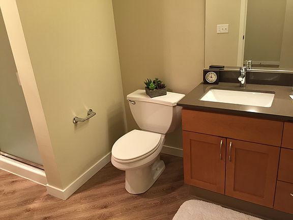 Bright bathroom with stand up shower
