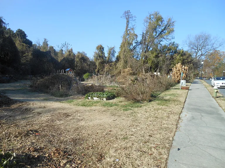 Garden with Strawberries and tool shed are visible. Running water/mulch and tools provided.