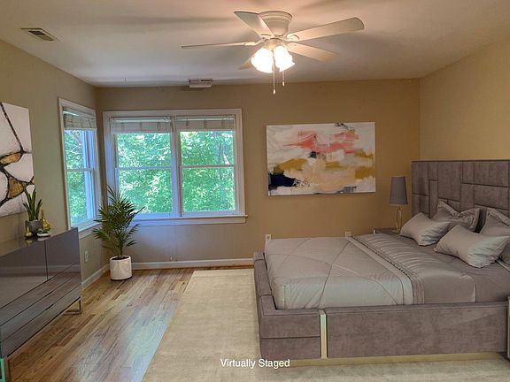 Another view of the gorgeous primary bedroom.