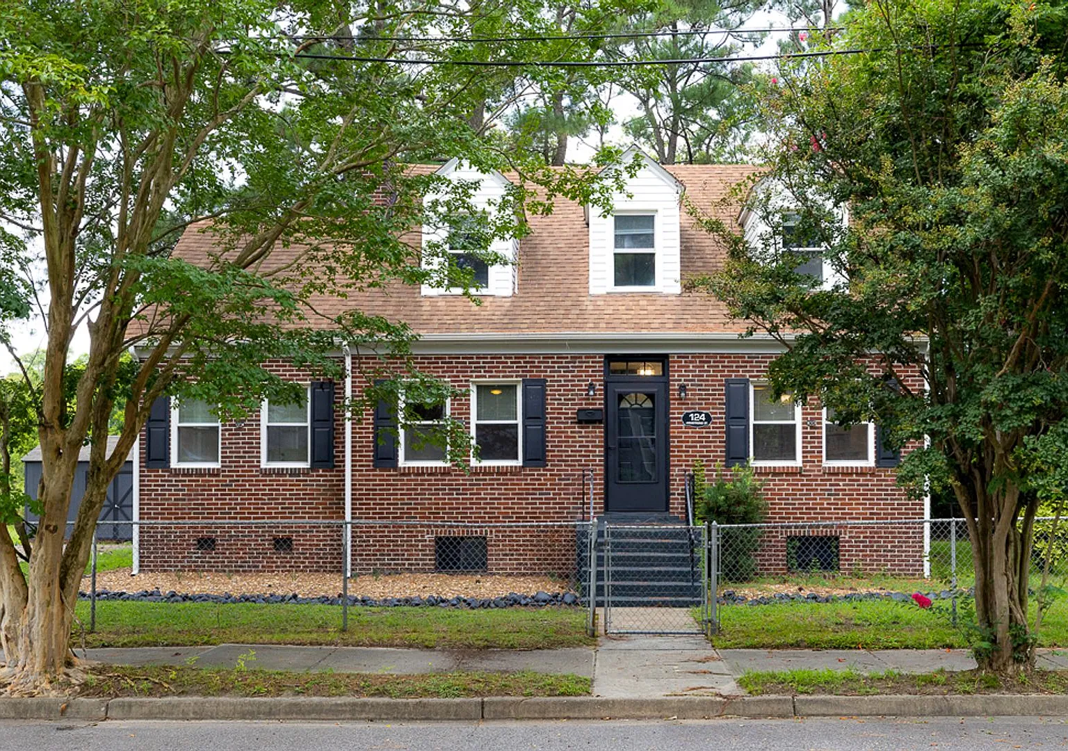 Beautifully updated 1948 Cape Cod offering 3 bedrooms, 3 full bathrooms for rent in Portsmouth VA! — Photo 1