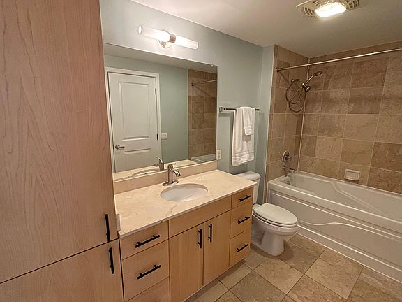 Large bathroom with tons of storage and in-unit washer/dryer