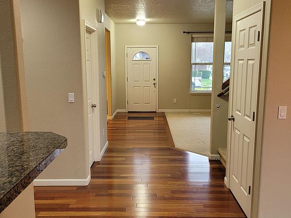 Living room Hallway- engineered hard wood floors.
