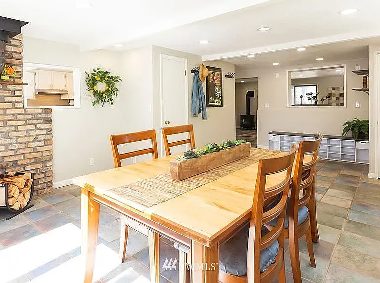 Dining Room, Wood Fireplace (Photo from Previous Listing)
