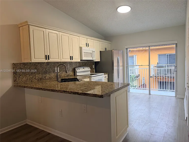 7730 W 34th Ln #14-202 — Photo 1