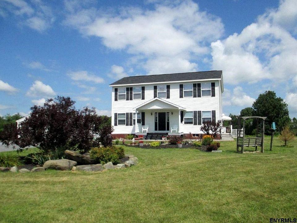2,240 square foot home, 4 Bedrooms, 2.5 Baths, Large 2 Car Garage, 8.82 acres.
