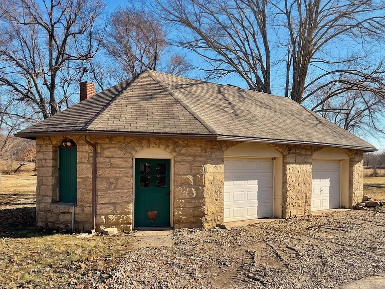 Oversized stone 2 car garage, originally a blacksmith in the 20's.