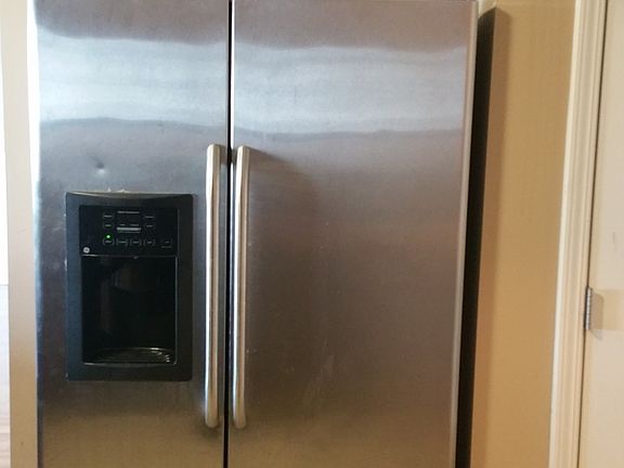 Stainless steel refrigerator included with rental